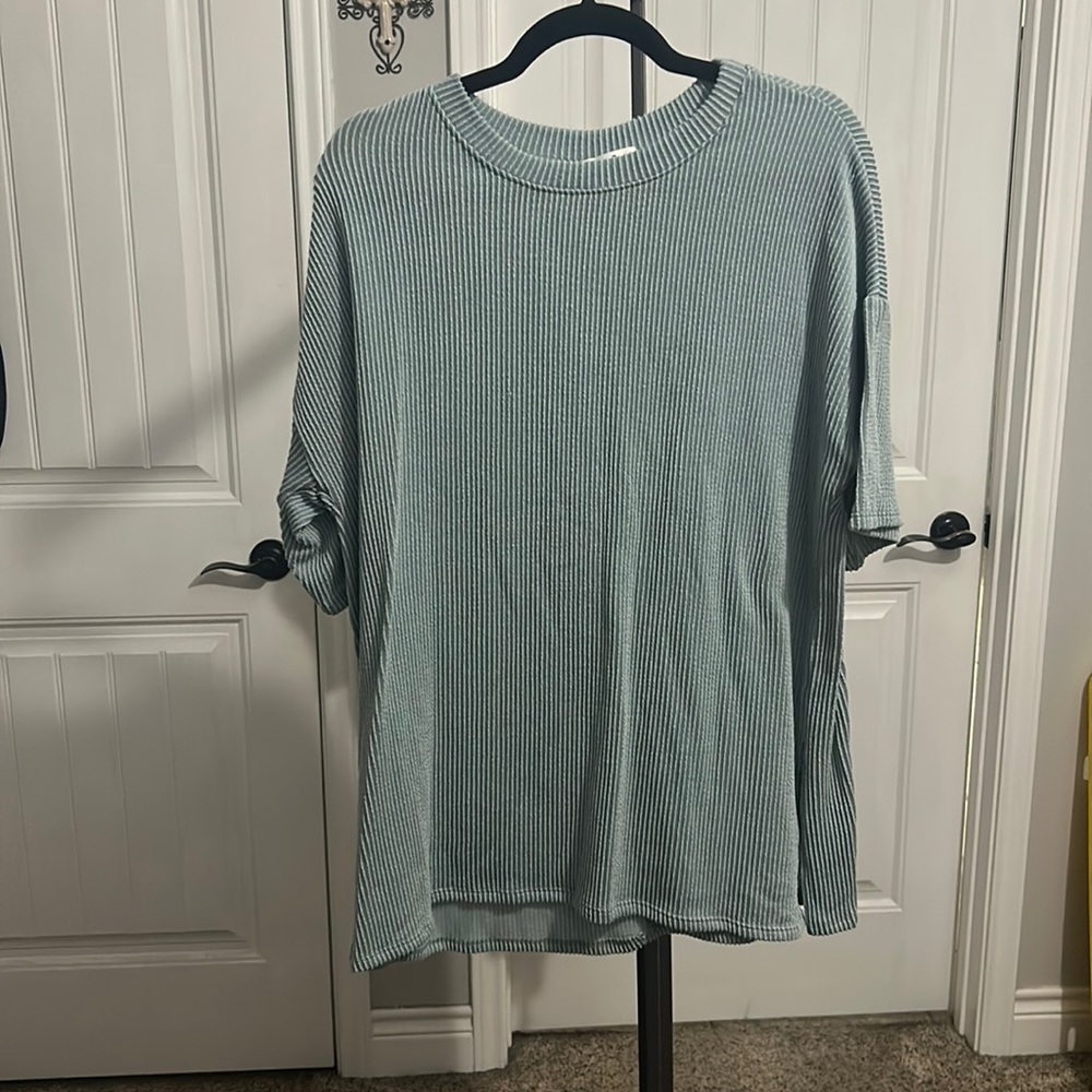 Tres Bien light blue shirt